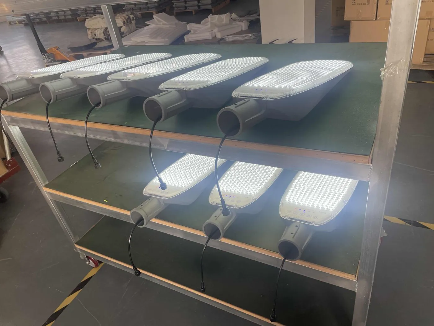 LED Module Assembly — Workers assembling LED street light modules on the production line